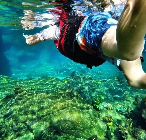 child Snorkeling in the caribbean