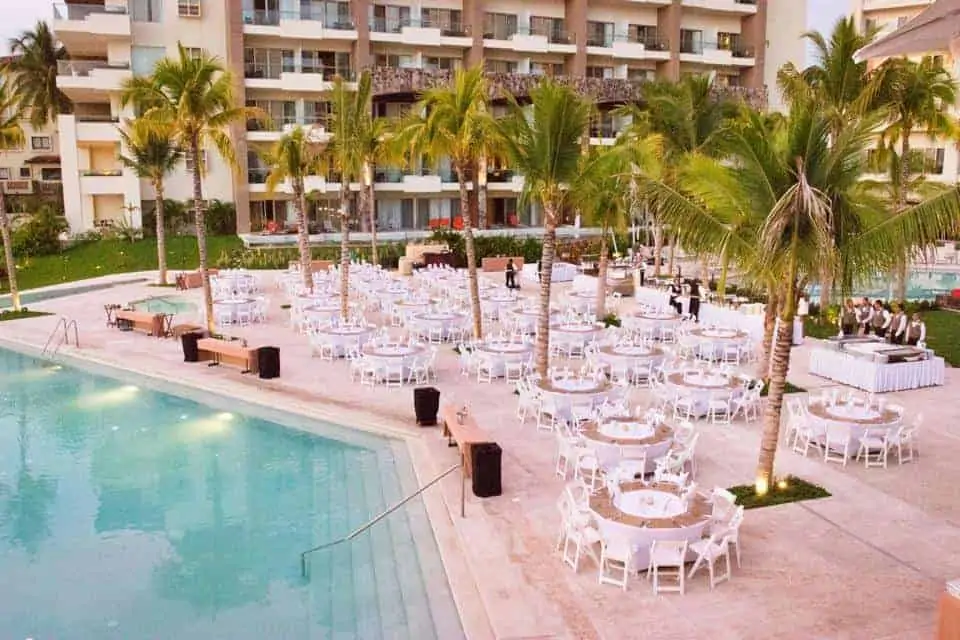 now amber poolside reception dinner setup