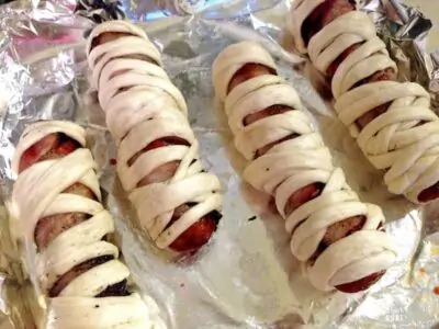 bacon wrapped sausage mummies halloween recipe