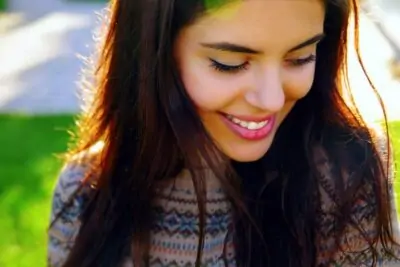 closeup portrait of a happy beautiful woman PLJXPS3