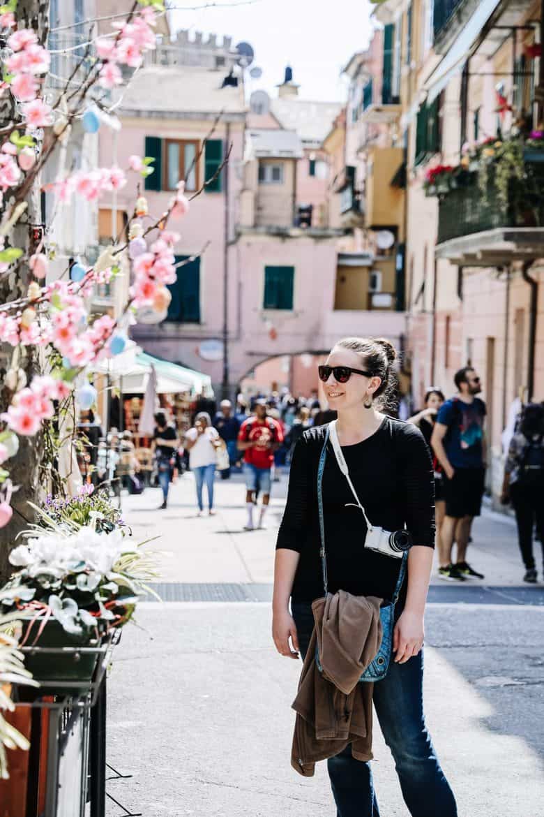 girl exploring a town in cinque terre italy