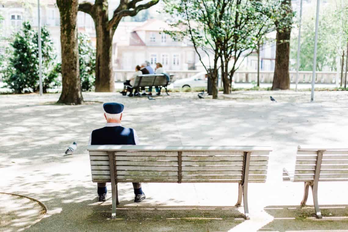 man sitting on bench