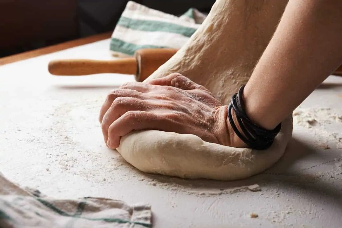 kneading bread dough