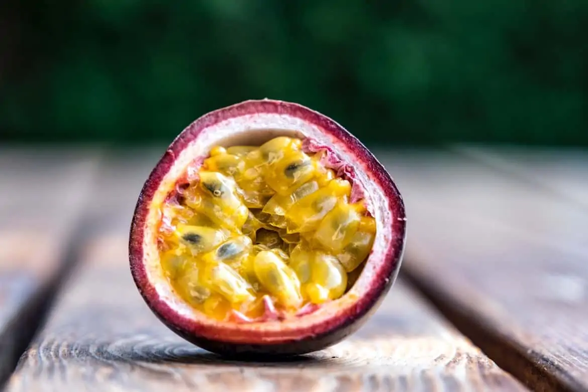 purple passion fruit cut in half