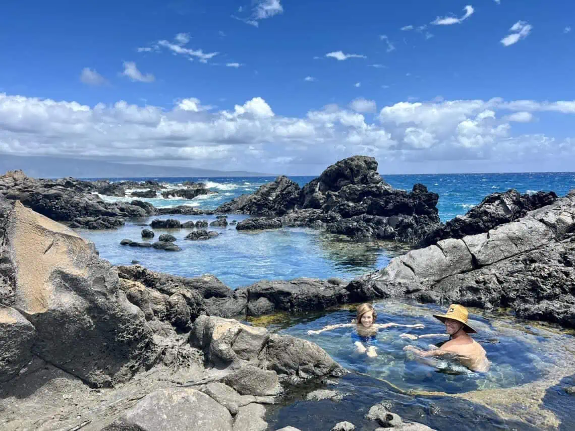 father and son enjoying kapalua tide pools